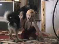 Blonde whore playing with big dog dick